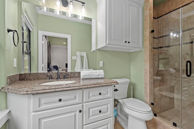 3706 Skyoak Ct, Spring, TX 77386 - bathroom with a shower stall, toilet, and vanity