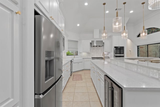 3706 Skyoak Ct, Spring, TX 77386 - kitchen with appliances with stainless steel finishes, wine cooler, wall chimney exhaust hood, a sink, and white cabinets