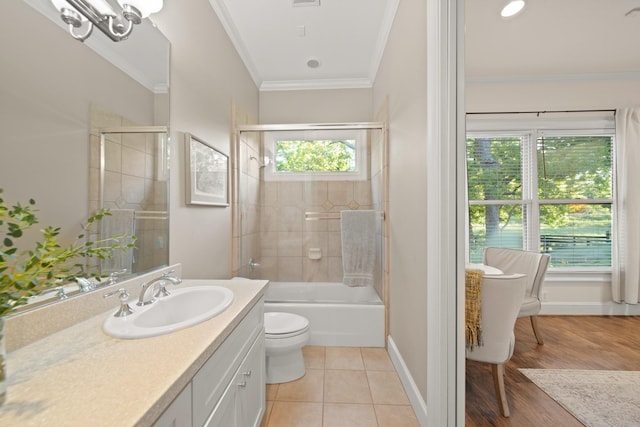 7527 Foster Island Dr, Richmond, TX 77406 - bathroom with vanity, ornamental molding, toilet, tile patterned flooring, and baseboards