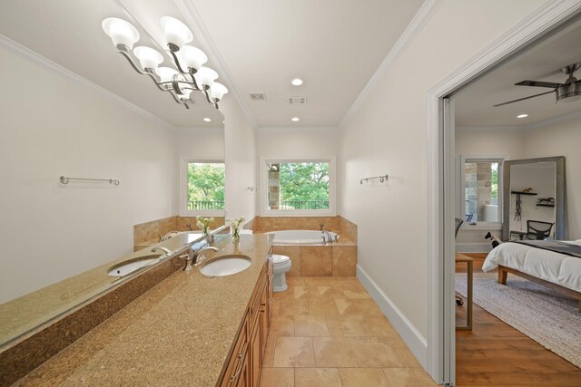 7527 Foster Island Dr, Richmond, TX 77406 - ensuite bathroom featuring a garden tub, ornamental molding, vanity, recessed lighting, and baseboards