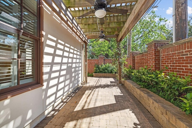 view of patio / terrace with ceiling fan and a fenced backyard