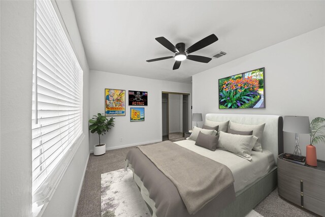 5023 Hull St, Houston, TX 77021 - carpeted bedroom featuring a closet, a ceiling fan, and baseboards