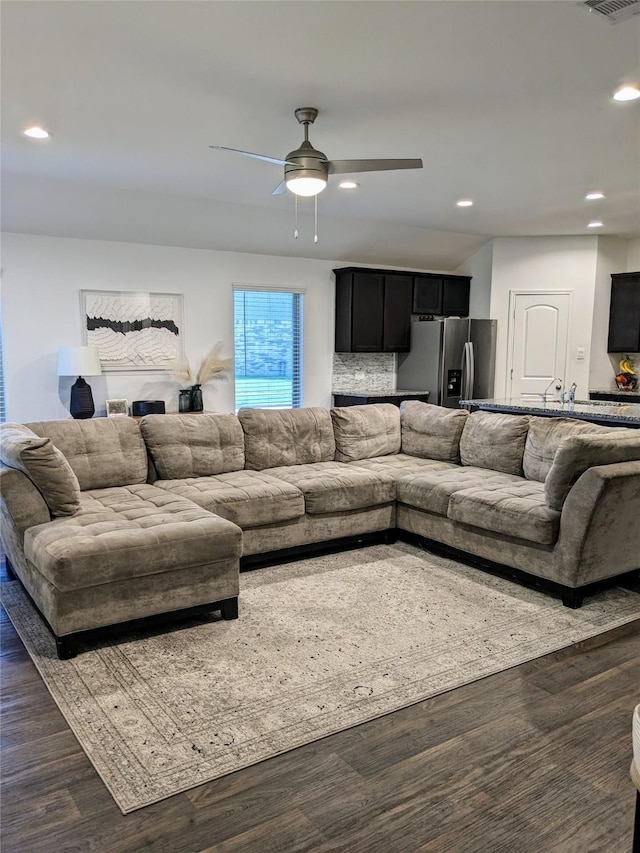 18475 Tenaha Mill Dr, New Caney, TX 77357 - living area with ceiling fan, dark wood-style flooring, and recessed lighting
