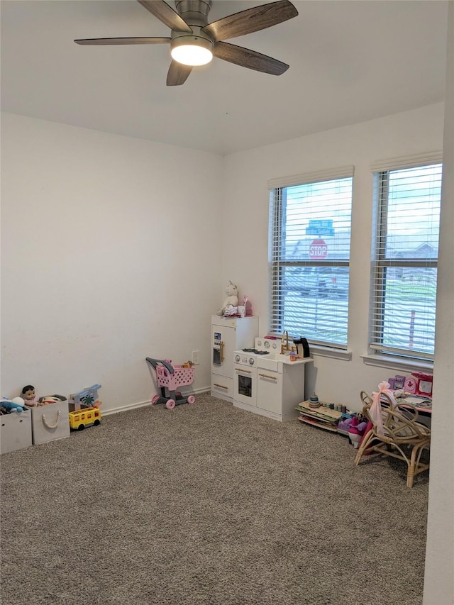 18475 Tenaha Mill Dr, New Caney, TX 77357 - playroom with carpet floors and a ceiling fan