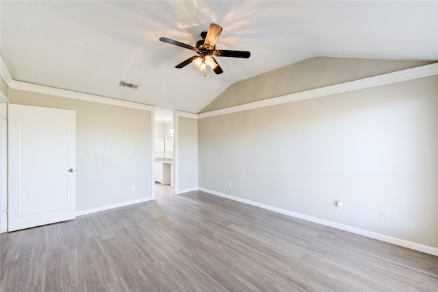 2036 Woodland Hills Dr, Missouri City, TX 77489 - unfurnished bedroom featuring lofted ceiling, wood finished floors, baseboards, and a ceiling fan