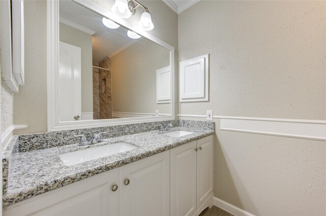 2036 Woodland Hills Dr, Missouri City, TX 77489 - bathroom with crown molding, double vanity, and a shower