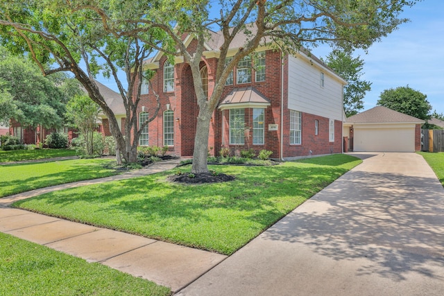 view of front of house with brick siding, a front yard, and a garage
