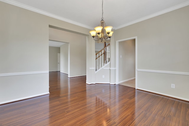 unfurnished room featuring a chandelier, stairs, ornamental molding, wood finished floors, and baseboards