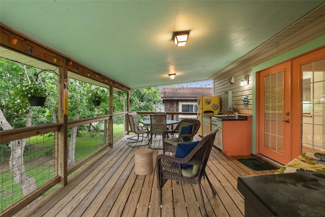 268 Seminole Dr, League City, TX 77565 - wooden deck featuring outdoor dining space and french doors