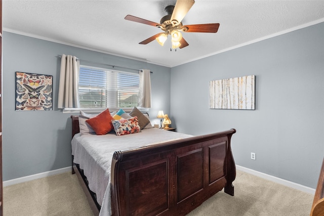 268 Seminole Dr, League City, TX 77565 - bedroom with light colored carpet, baseboards, a ceiling fan, a textured ceiling, and ornamental molding