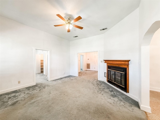 102 Besch Wilburn Ln, Glidden, TX 78943 - unfurnished living room with ceiling fan, carpet, and baseboards