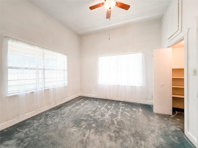 102 Besch Wilburn Ln, Glidden, TX 78943 - empty room with carpet flooring, ceiling fan, and baseboards