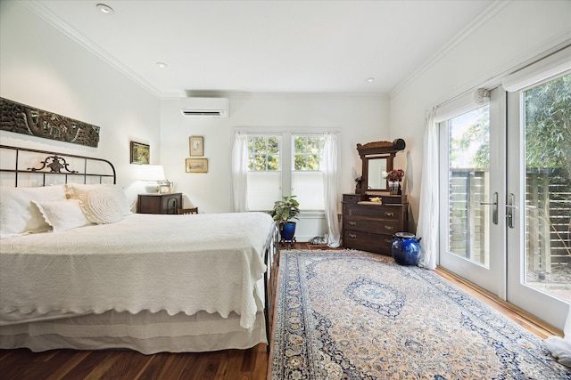 1755 Kipling St, Houston, TX 77098 - bedroom with a wall mounted air conditioner, access to exterior, wood finished floors, ornamental molding, and french doors