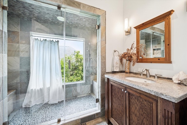 1755 Kipling St, Houston, TX 77098 - bathroom with a stall shower and vanity