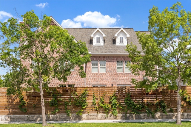 1755 Kipling St, Houston, TX 77098 - view of front of property featuring fence and brick siding