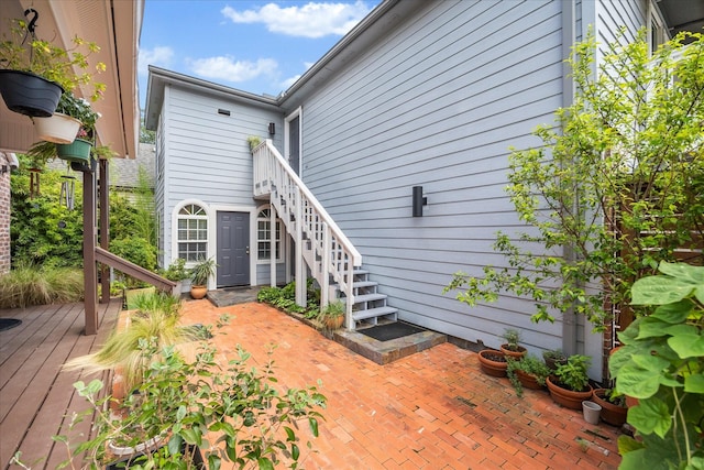 1755 Kipling St, Houston, TX 77098 - rear view of property featuring stairs, a patio area, and a deck