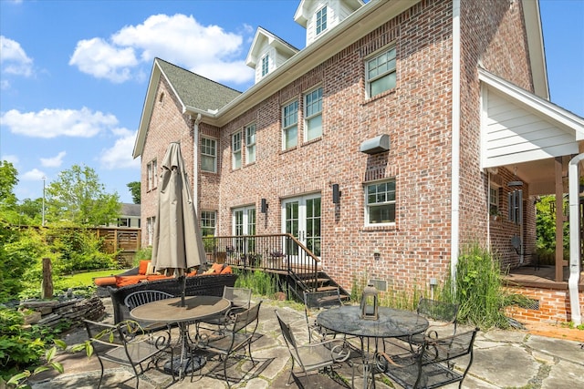 1755 Kipling St, Houston, TX 77098 - view of patio with outdoor dining space and a wooden deck