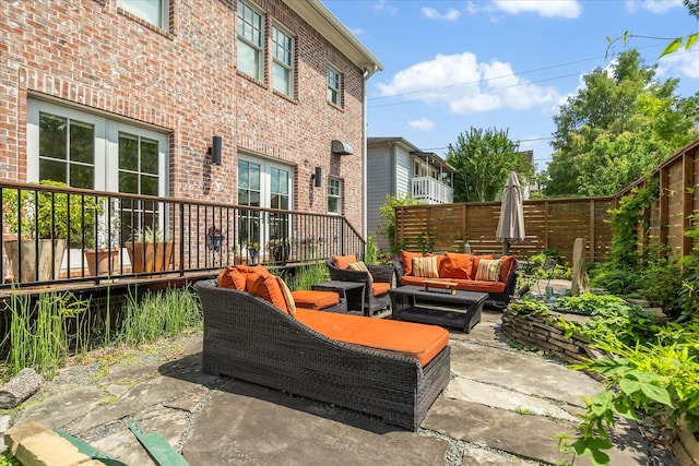 1755 Kipling St, Houston, TX 77098 - view of patio featuring an outdoor hangout area and fence