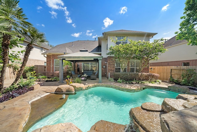 view of pool featuring a gazebo, a patio area, and a fenced backyard