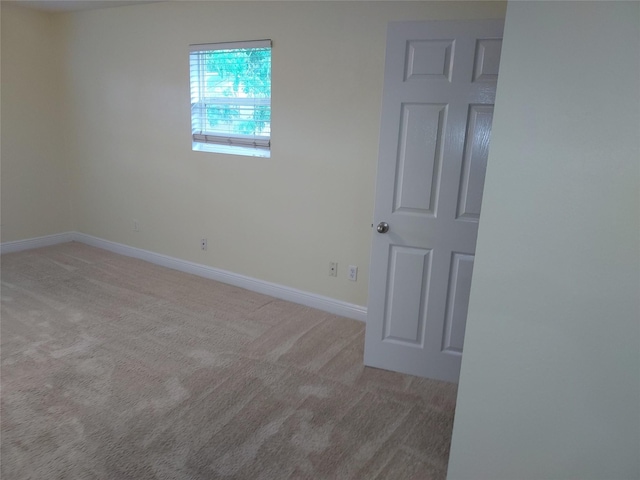 509 S Ramona St, Angleton, TX 77515 - carpeted empty room featuring baseboards