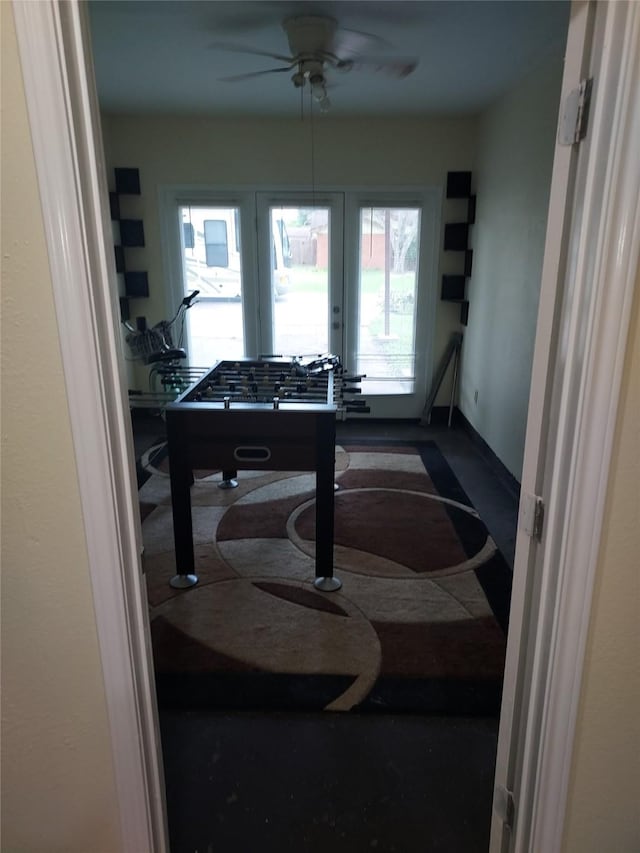 509 S Ramona St, Angleton, TX 77515 - recreation room with french doors, a ceiling fan, healthy amount of natural light, and baseboards