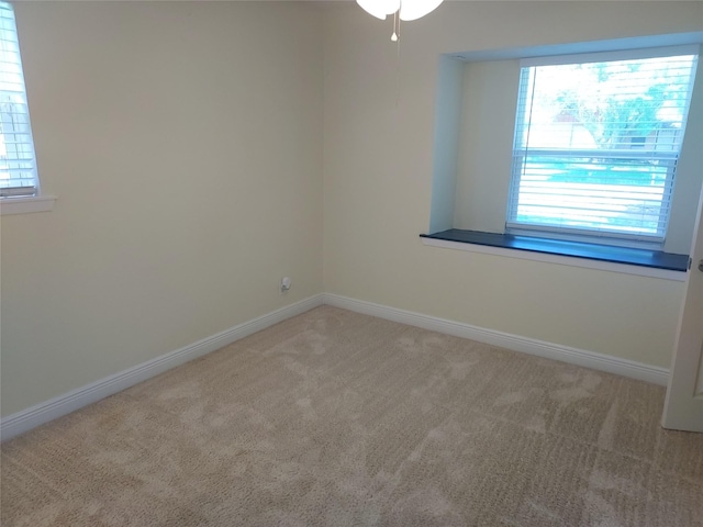 509 S Ramona St, Angleton, TX 77515 - carpeted empty room featuring baseboards