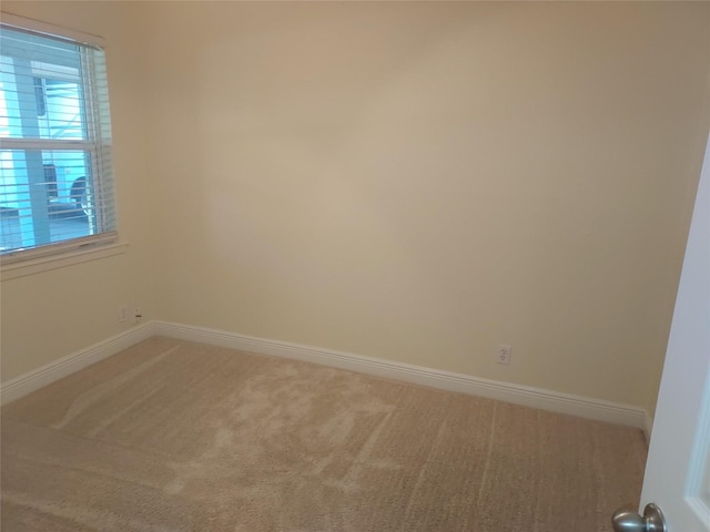 509 S Ramona St, Angleton, TX 77515 - unfurnished room with light carpet and baseboards