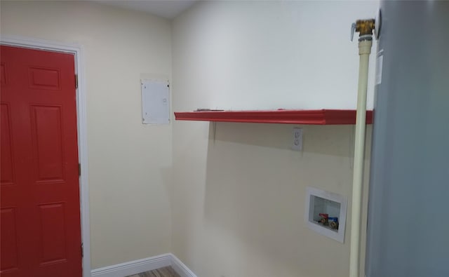 509 S Ramona St, Angleton, TX 77515 - clothes washing area with washer hookup, baseboards, and electric panel
