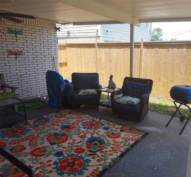 509 S Ramona St, Angleton, TX 77515 - view of patio featuring fence, a grill, and an outdoor living space