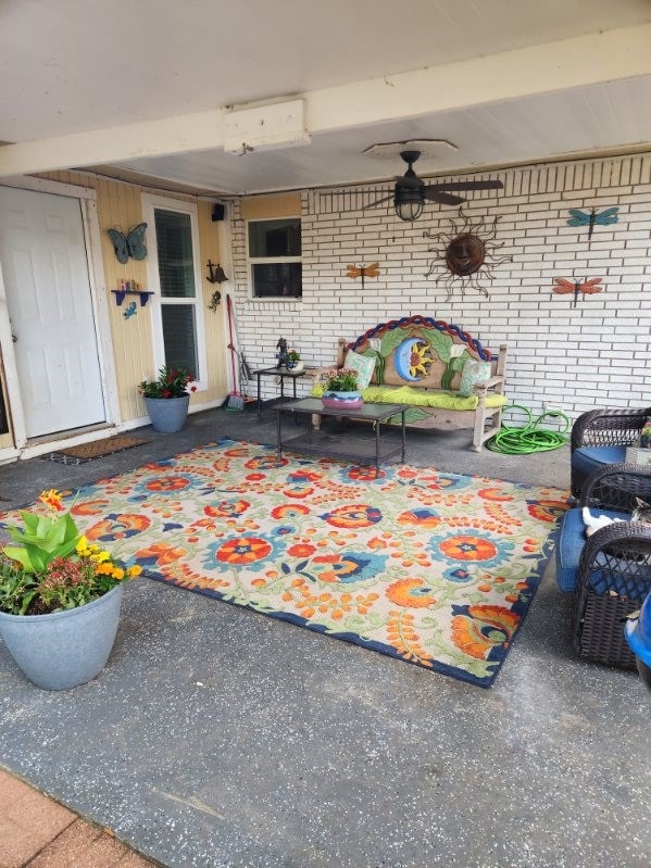 509 S Ramona St, Angleton, TX 77515 - view of patio with outdoor lounge area and an AC wall unit