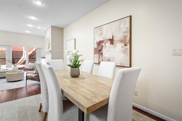 6728 Buffalo Speedway, West University Place, TX 77005 - dining area featuring wood finished floors, recessed lighting, and baseboards