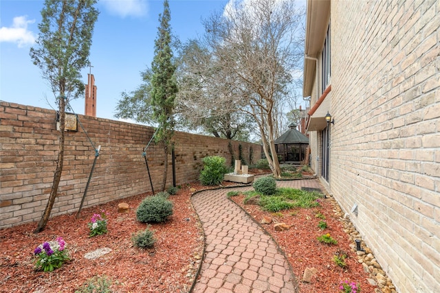 6728 Buffalo Speedway, West University Place, TX 77005 - fenced backyard with a gazebo