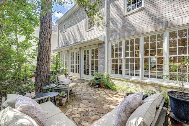 view of patio with french doors and outdoor lounge area