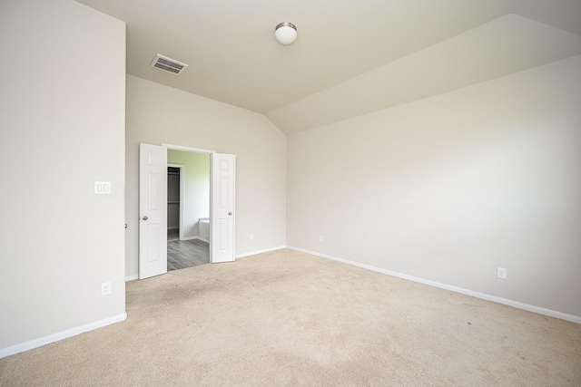 108 Shallow Creek Dr, Waller, TX 77445 - carpeted empty room featuring vaulted ceiling and baseboards