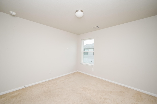108 Shallow Creek Dr, Waller, TX 77445 - unfurnished room featuring light carpet, baseboards, and a smoke detector