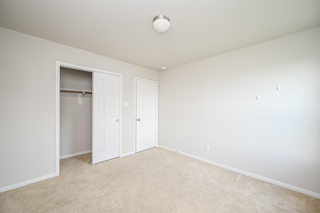 108 Shallow Creek Dr, Waller, TX 77445 - unfurnished bedroom with carpet, baseboards, and a closet