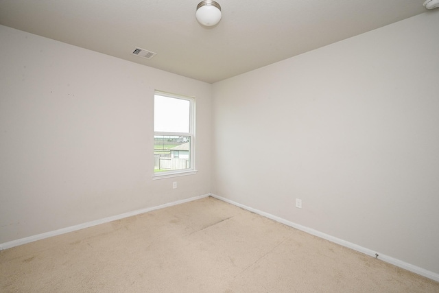 108 Shallow Creek Dr, Waller, TX 77445 - empty room featuring light colored carpet and baseboards