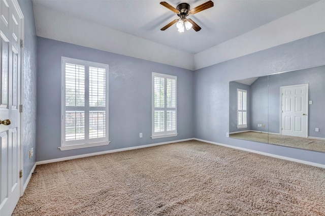 14406 Concord Grv, Houston, TX 77084 - unfurnished room with plenty of natural light, carpet floors, ceiling fan, and lofted ceiling