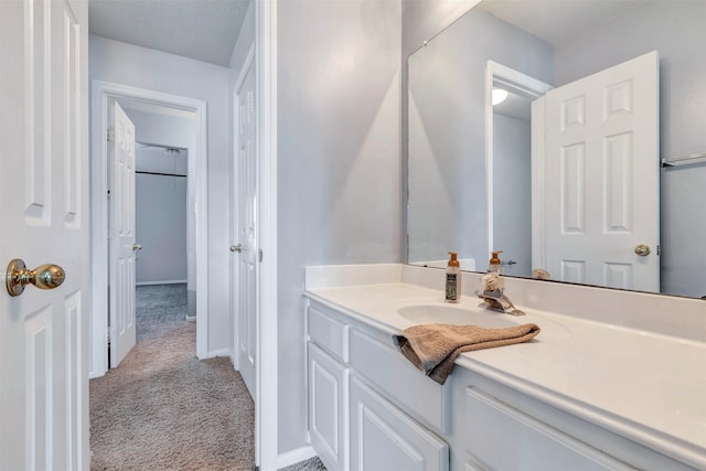 14406 Concord Grv, Houston, TX 77084 - bathroom with vanity and baseboards