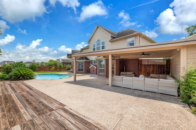 14406 Concord Grv, Houston, TX 77084 - view of swimming pool with outdoor lounge area, a ceiling fan, a fenced backyard, and a patio area