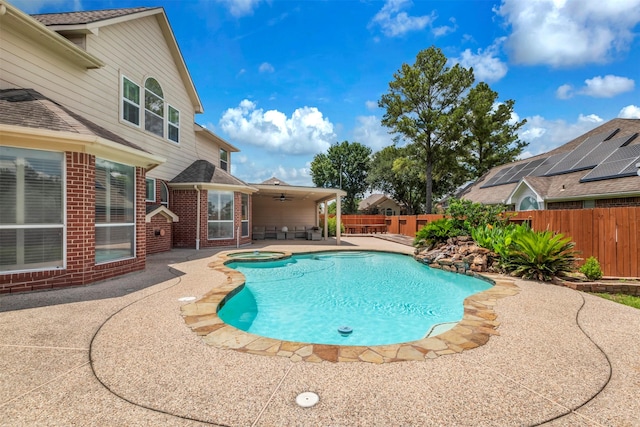14406 Concord Grv, Houston, TX 77084 - view of pool with a ceiling fan, a fenced backyard, a patio area, and a pool with connected hot tub