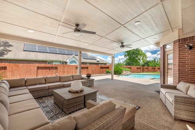 14406 Concord Grv, Houston, TX 77084 - view of patio / terrace with an outdoor living space, a fenced backyard, and ceiling fan
