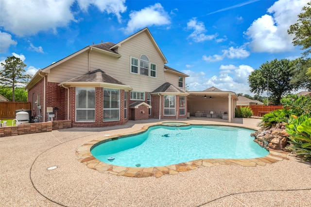 14406 Concord Grv, Houston, TX 77084 - view of pool featuring a patio, a fenced backyard, a ceiling fan, and a pool with connected hot tub