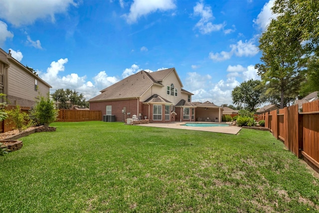 14406 Concord Grv, Houston, TX 77084 - back of property with brick siding and a patio