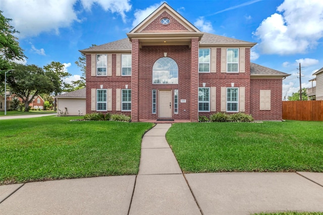 14406 Concord Grv, Houston, TX 77084 - view of front of home with brick siding and a shingled roof
