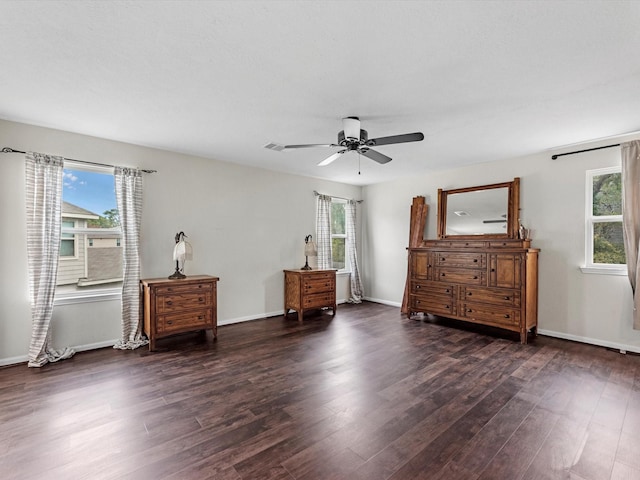 14203 Broad Cypress Ct, Houston, TX 77068 - bedroom with multiple windows, dark wood-type flooring, and ceiling fan