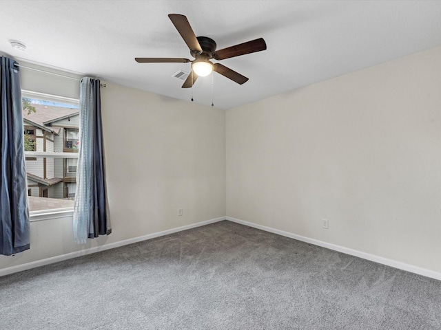 14203 Broad Cypress Ct, Houston, TX 77068 - empty room with carpet, ceiling fan, baseboards, and a smoke detector