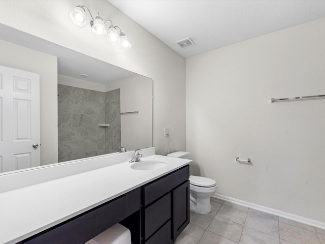 14203 Broad Cypress Ct, Houston, TX 77068 - bathroom featuring tile patterned floors, vanity, toilet, baseboards, and tiled shower
