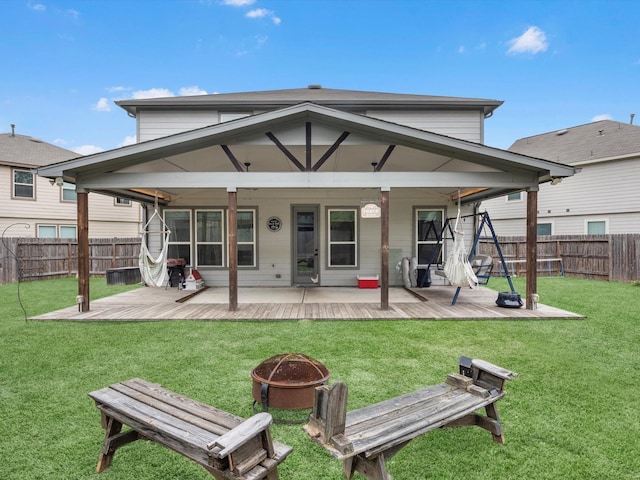 14203 Broad Cypress Ct, Houston, TX 77068 - back of house with an outdoor fire pit and a deck