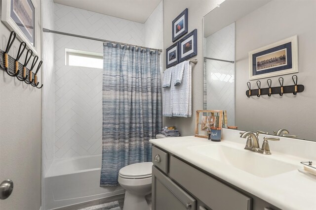 5734 Arden Way, Pasadena, TX 77505 - bathroom with toilet, vanity, shower / tub combo, and wood finished floors
